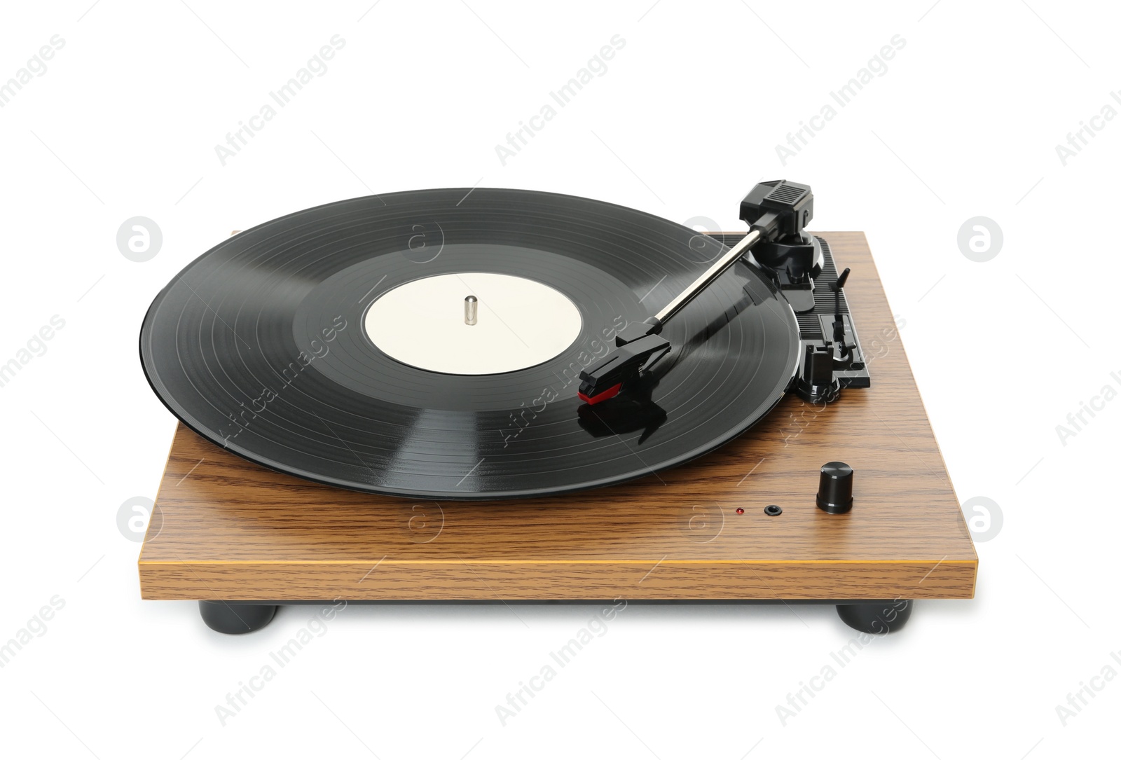 Photo of Modern turntable with vinyl record isolated on white