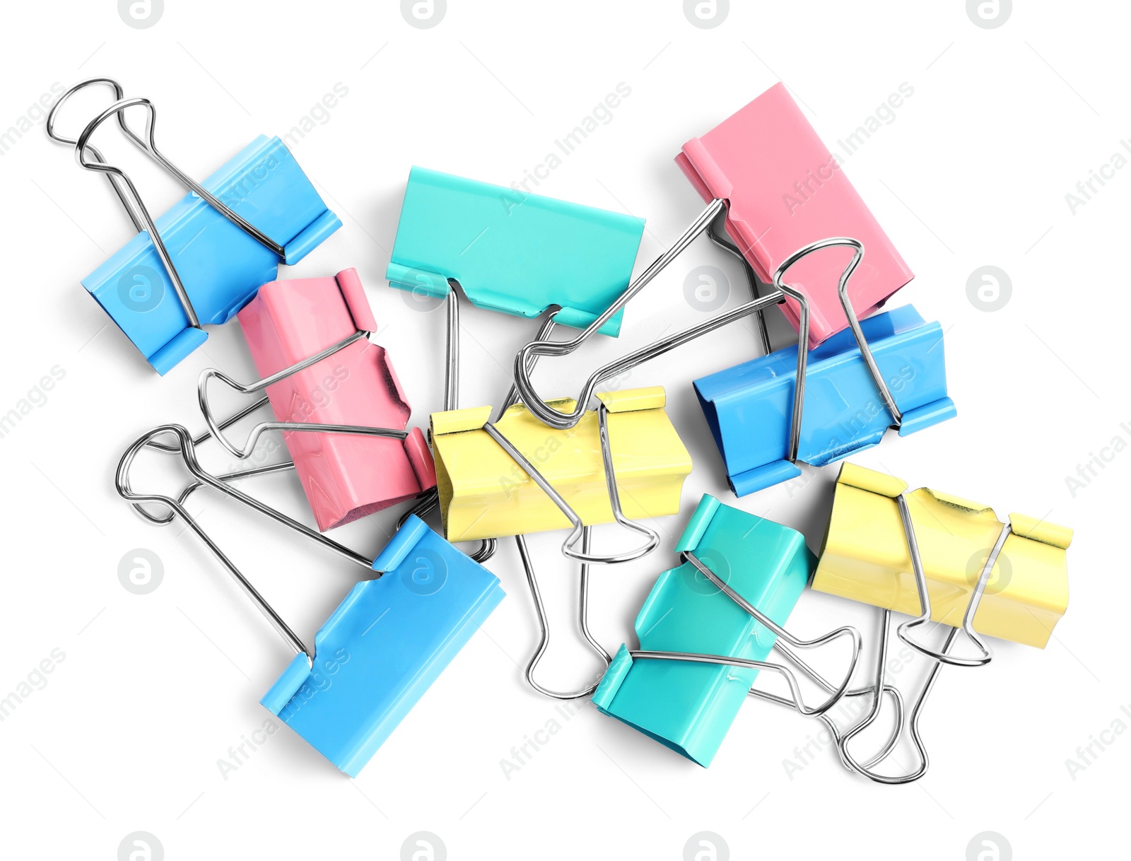 Photo of Colorful binder clips on white background, top view. Stationery item