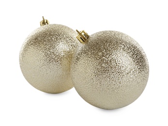 Photo of Beautiful shiny Christmas balls on white background