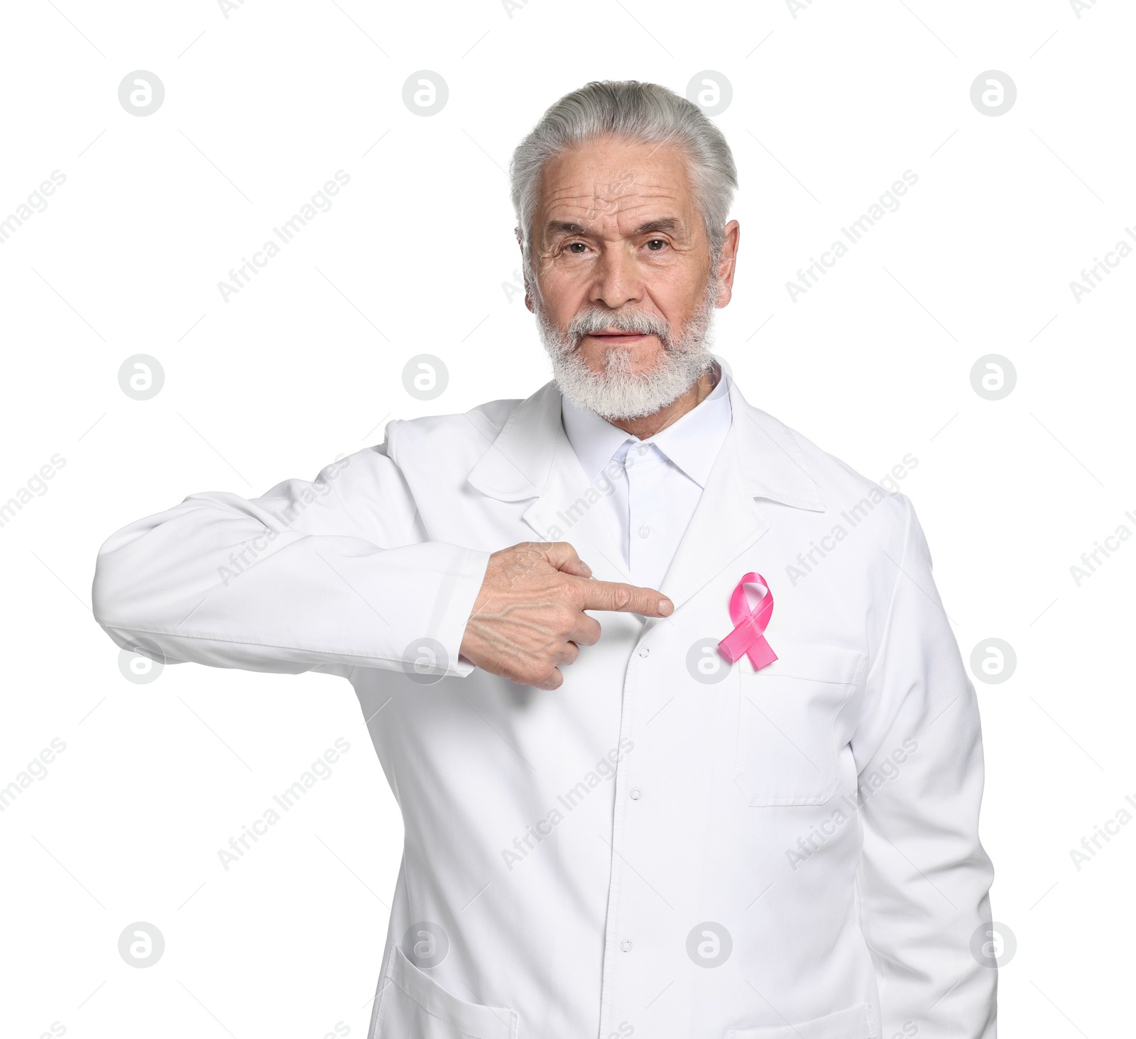 Photo of Mammologist pointing at pink ribbon on white background. Breast cancer awareness