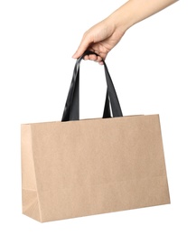 Woman holding paper shopping bag isolated on white, closeup