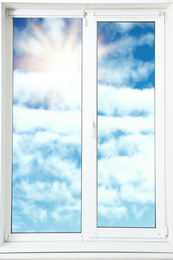 Image of Beautiful view on blue sky with clouds through window