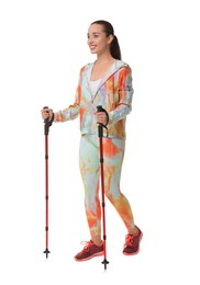 Photo of Young woman practicing Nordic walking with poles isolated on white