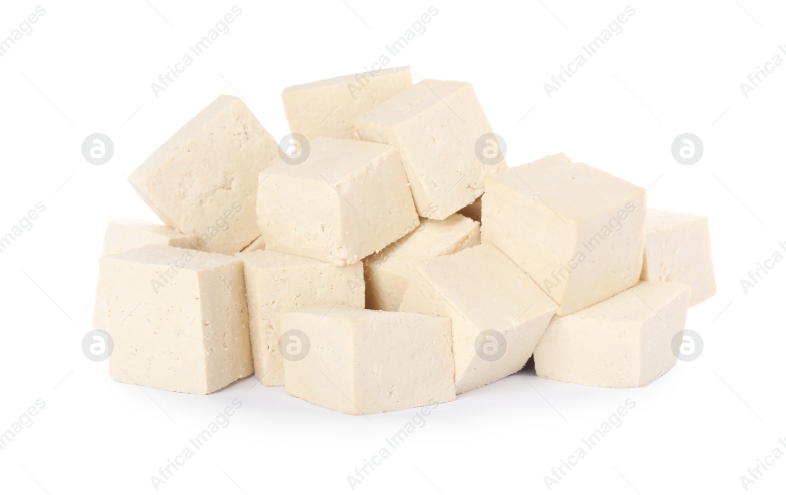 Photo of Cubes of delicious raw tofu on white background