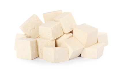 Photo of Cubes of delicious raw tofu on white background