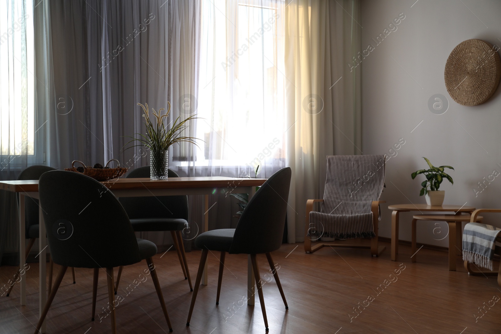 Photo of Window with stylish curtains in living room interior