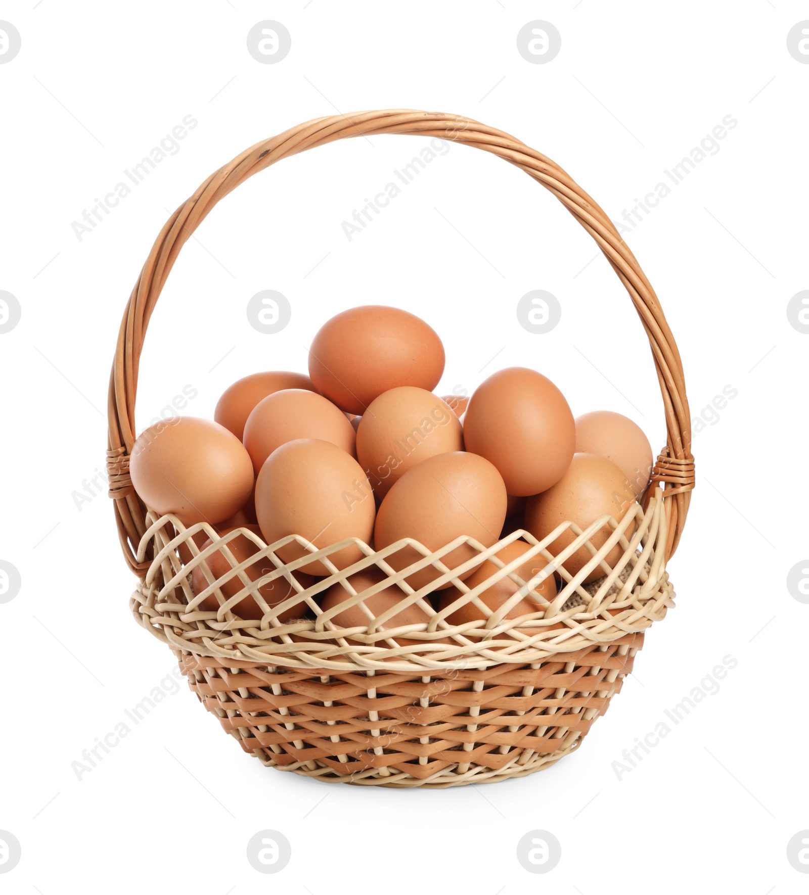 Photo of Chicken eggs in wicker basket isolated on white