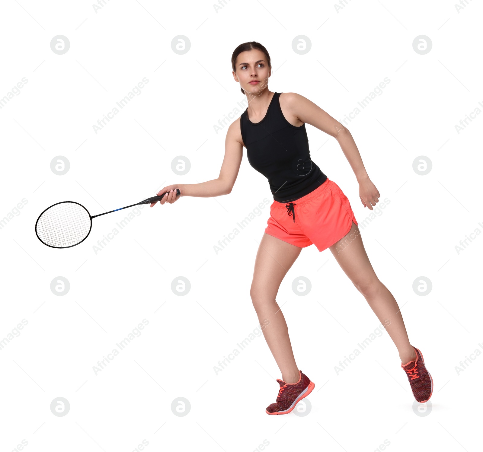 Photo of Young woman playing badminton with racket on white background