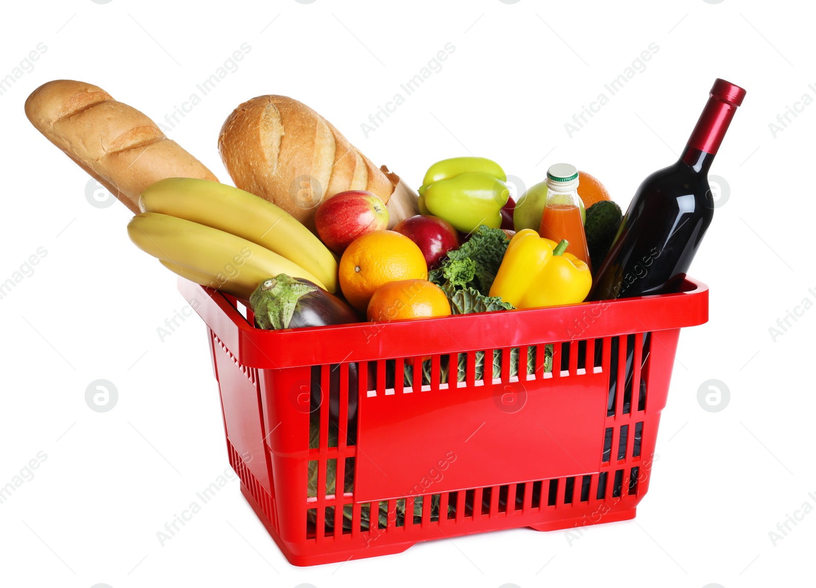 Photo of Shopping basket with grocery products on white background