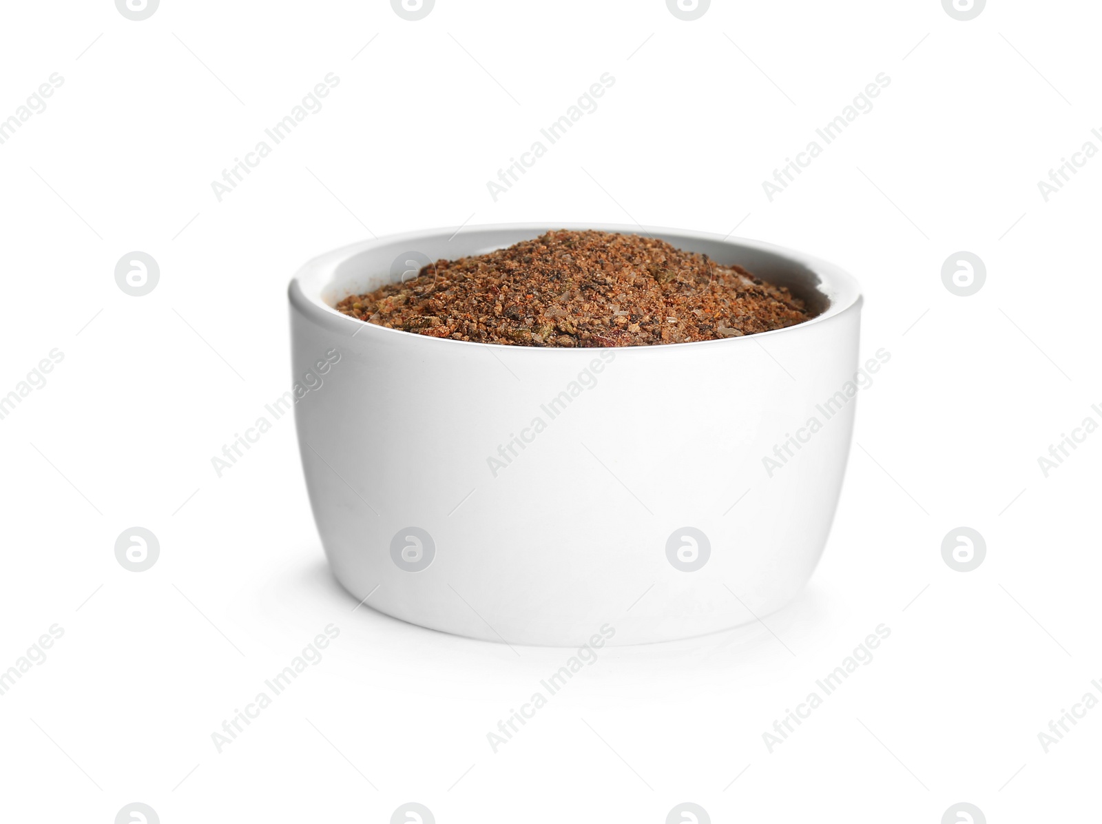 Photo of Bowl of ground pepper isolated on white