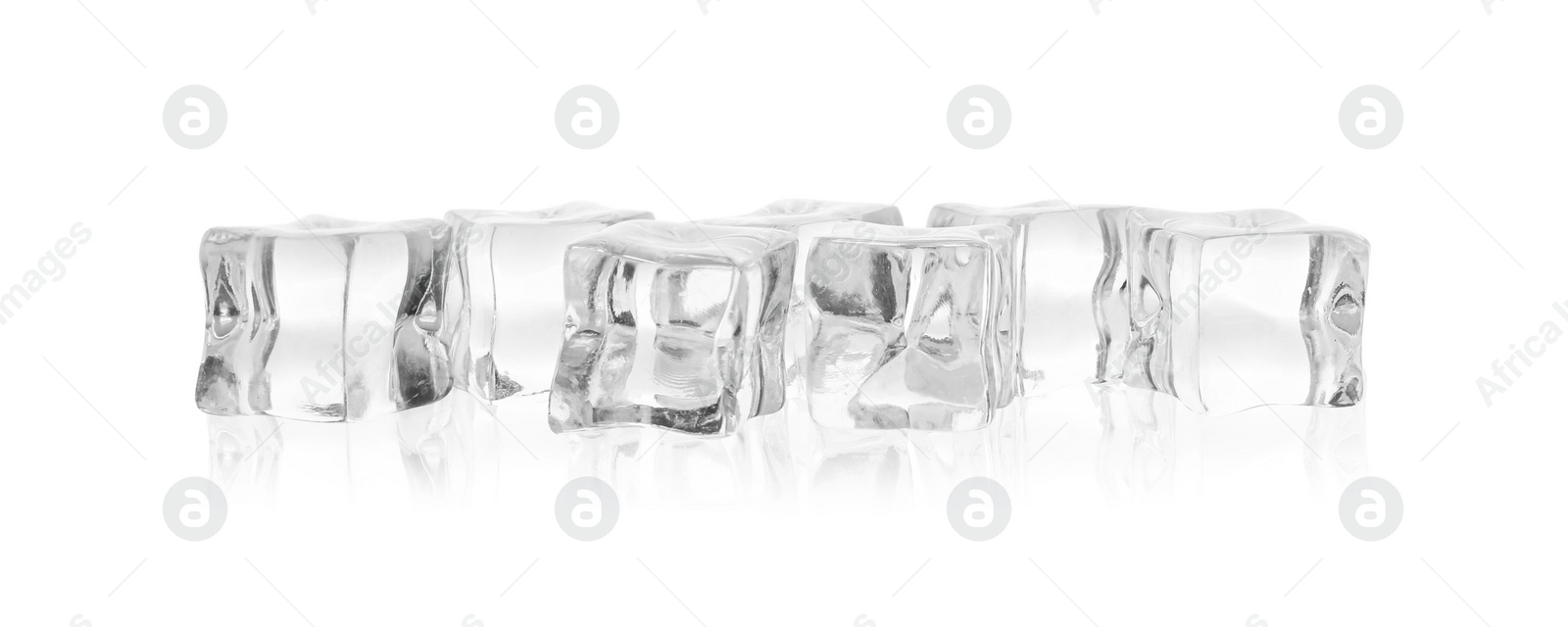 Photo of Many crystal clear ice cubes isolated on white