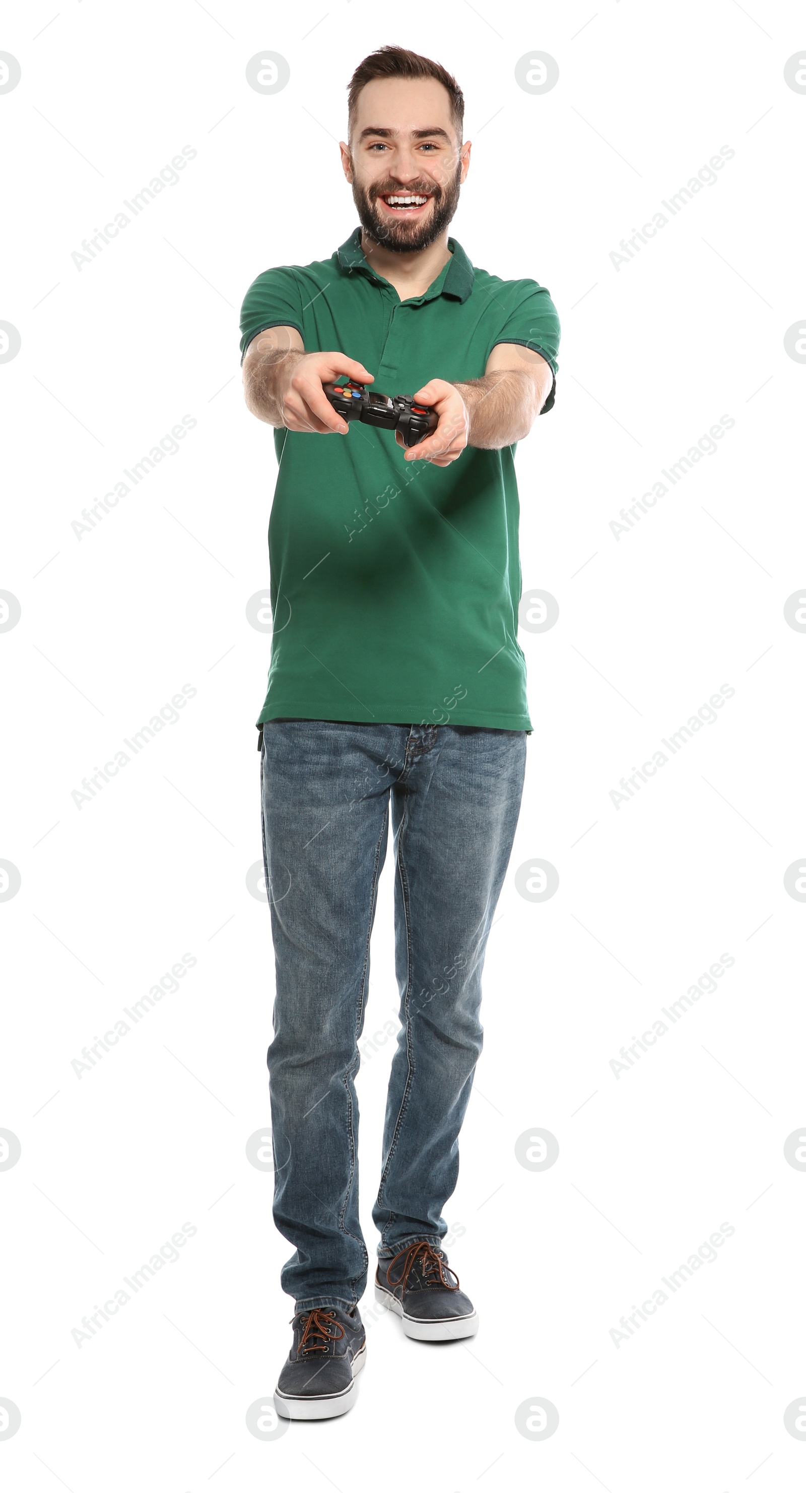Photo of Emotional young man playing video games with controller isolated on white