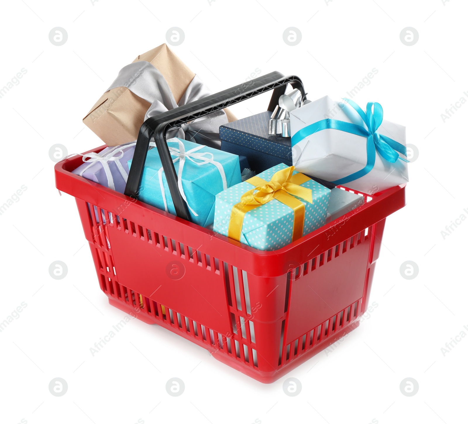 Photo of Red shopping basket with different gifts on white background