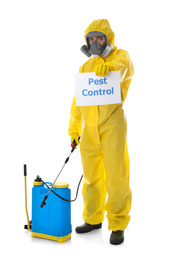 Photo of Man wearing protective suit with insecticide sprayer and sign PEST CONTROL on white background