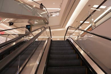 Photo of DUBAI, UNITED ARAB EMIRATES - NOVEMBER 03, 2018: Modern escalators in shopping mall