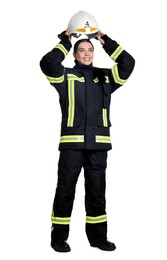 Full length portrait of firefighter in uniform wearing helmet on white background