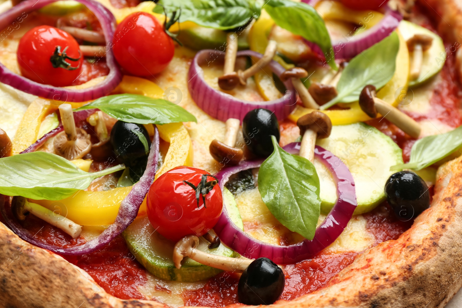 Photo of Delicious hot vegetable pizza with mushrooms as background, closeup