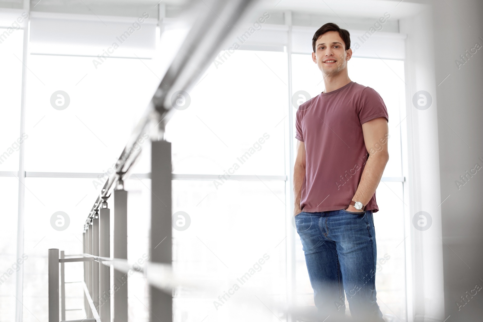 Photo of Portrait of confident young man, indoors