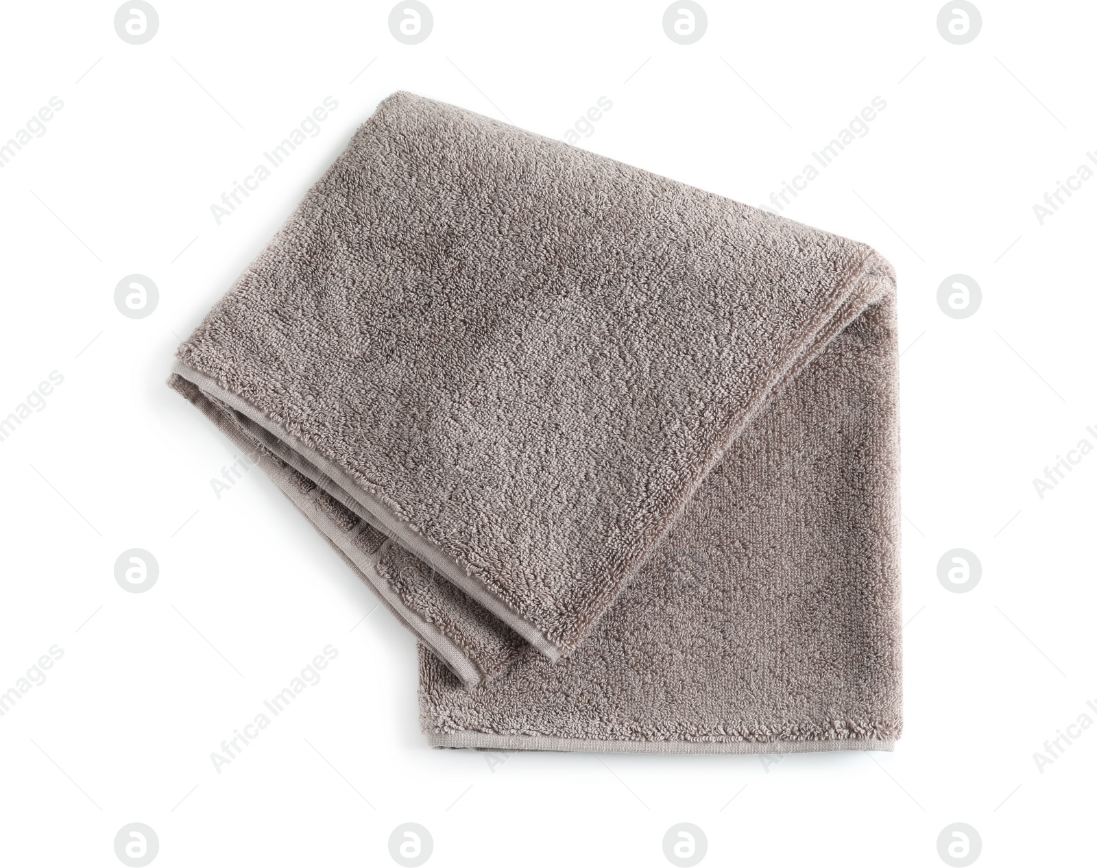 Photo of Soft folded towel isolated on white, top view