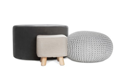 Photo of Different poufs on white background. Home design