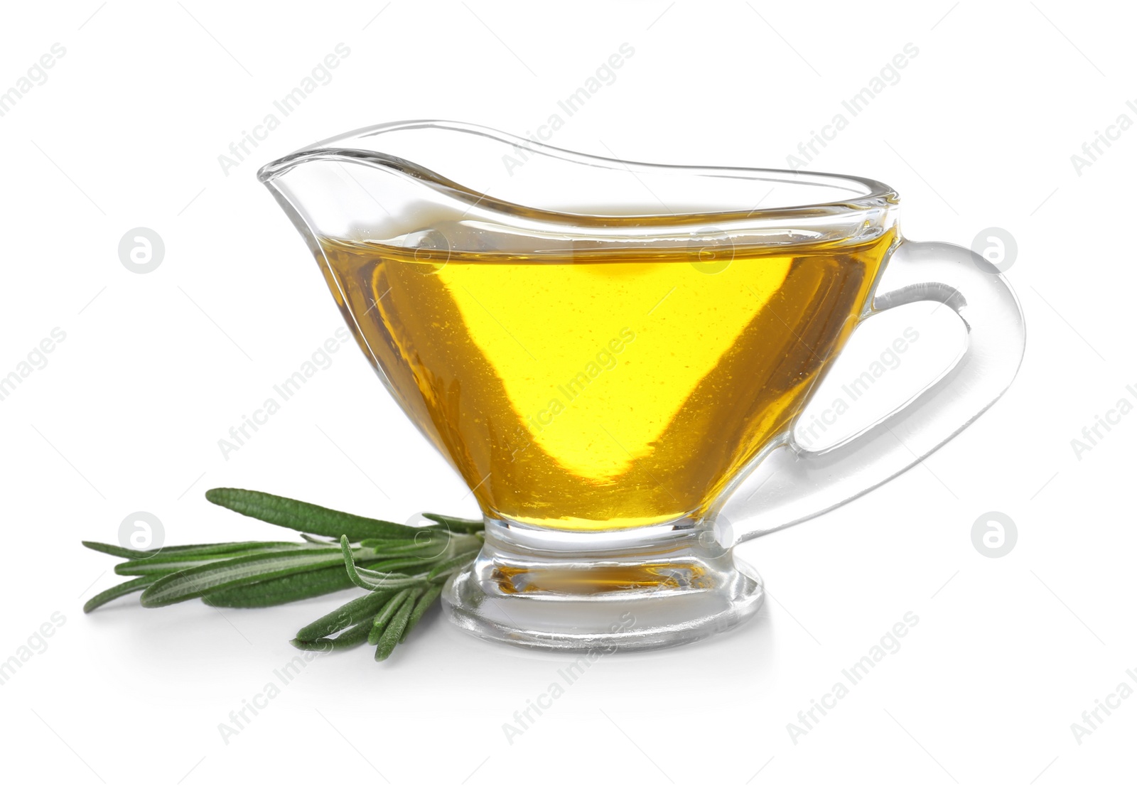 Photo of Gravy boat with rosemary oil on white background