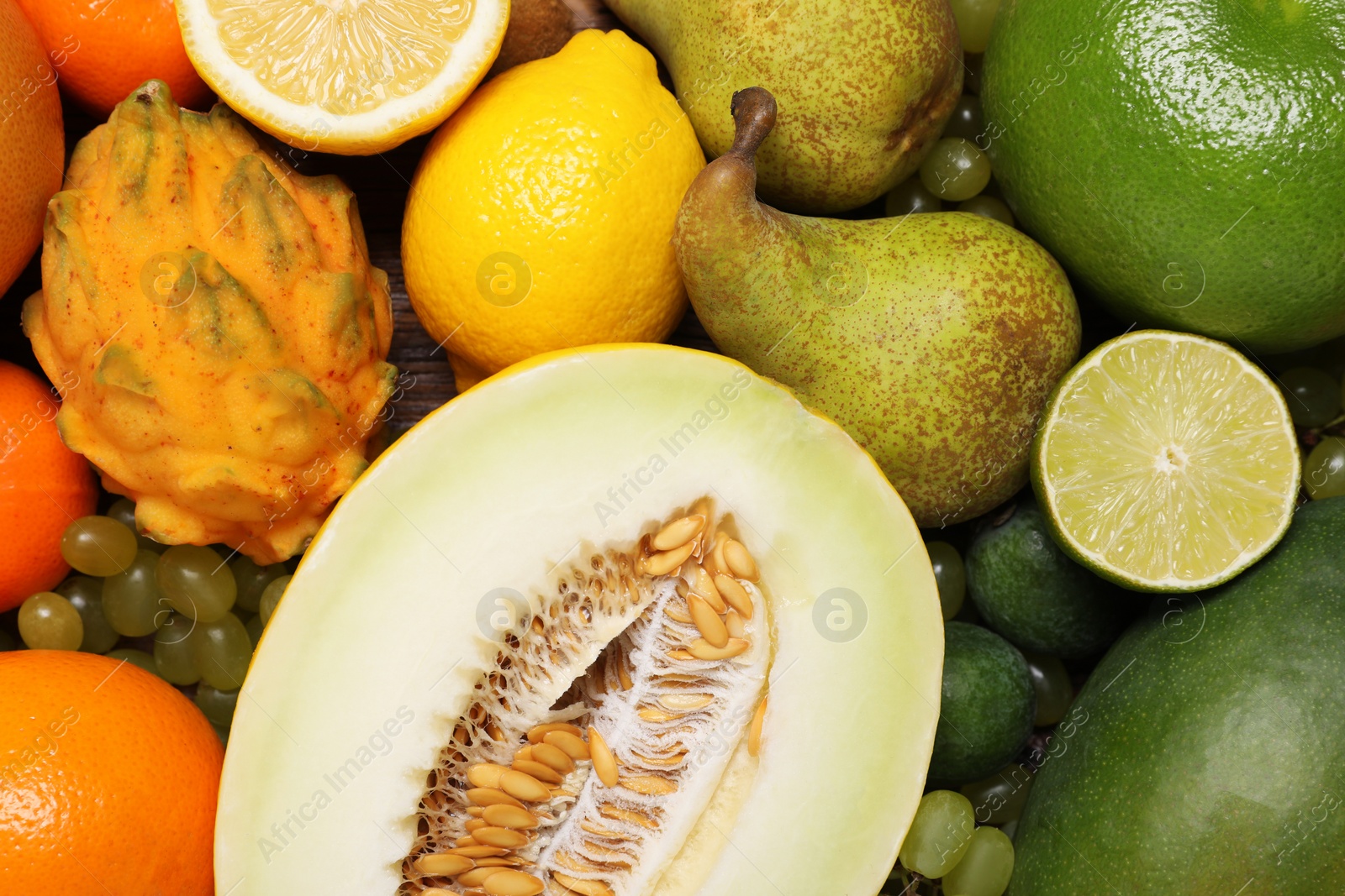 Photo of Many different fresh fruits and berries as background, top view