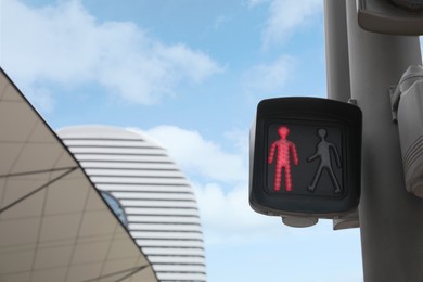 Photo of Traffic light for pedestrians on city street