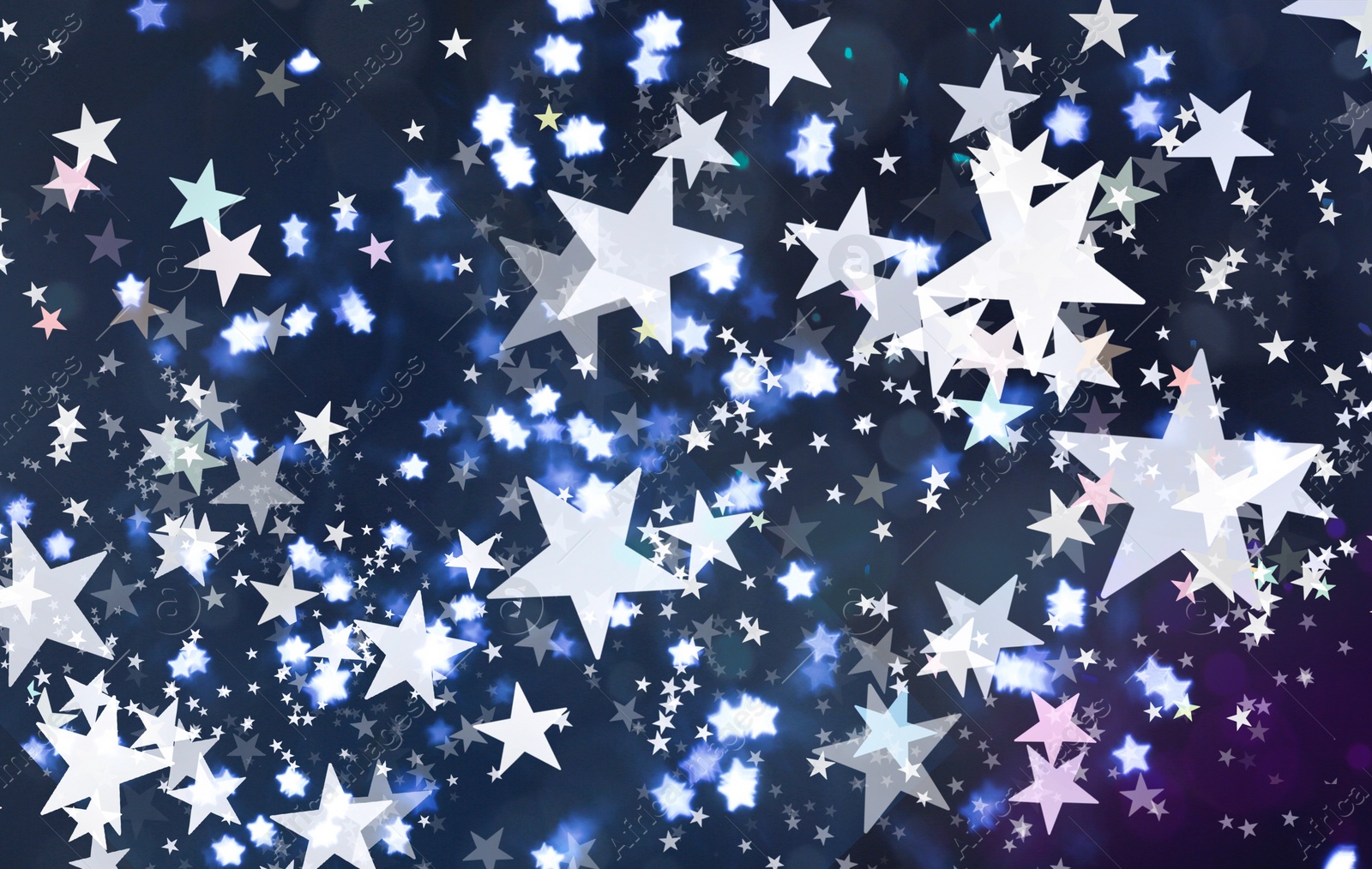 Image of Festive background with many beautiful shimmering stars and blurred lights. Bokeh effect