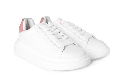 Photo of Pair of stylish sneakers on white background