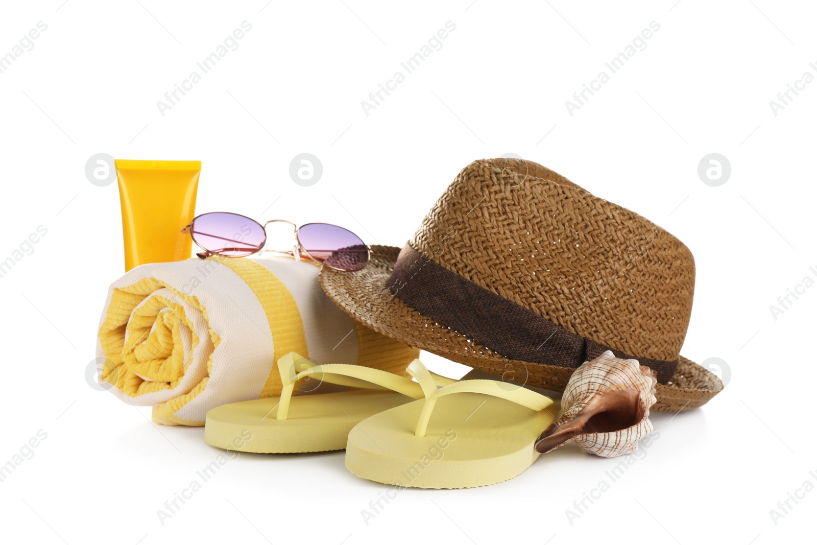 Photo of Different stylish beach accessories on white background