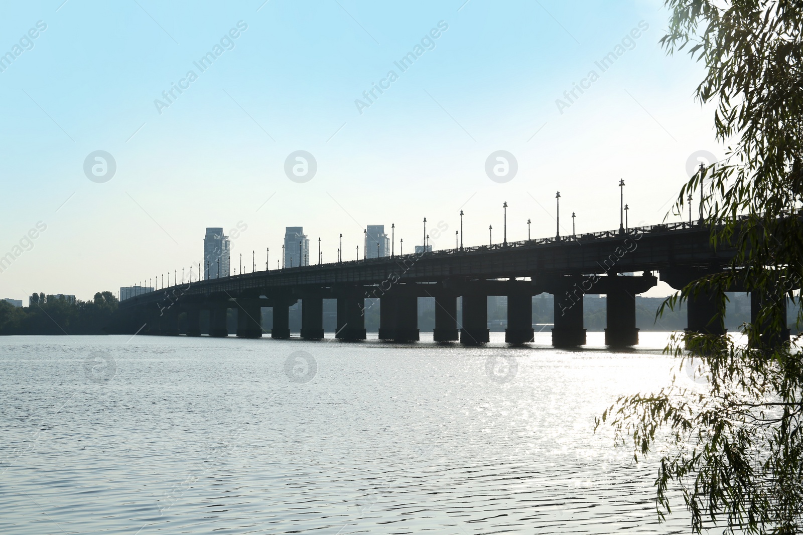 Photo of Beautiful view of beam bridge over river on sunny day