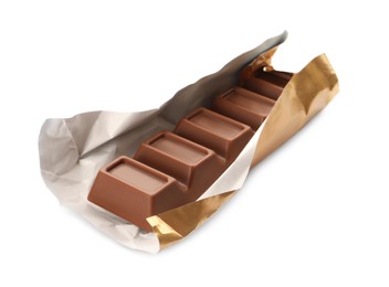 Photo of Paper wrap with delicious chocolate bar on white background