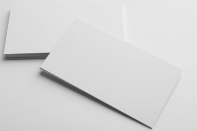 Photo of Blank business cards on light grey background. Mockup for design