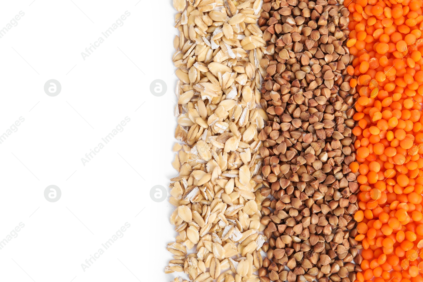 Photo of Different grains and cereals isolated on white, top view