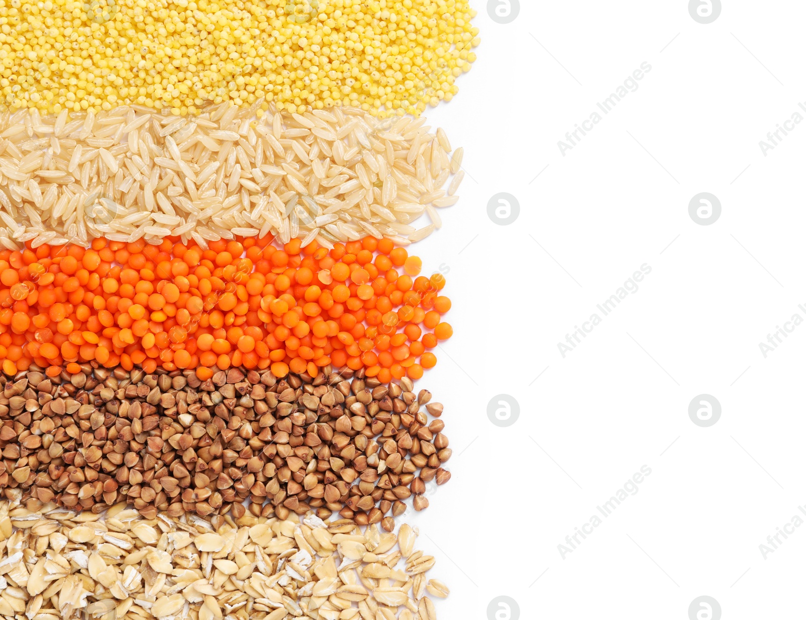 Photo of Different grains and cereals isolated on white, top view