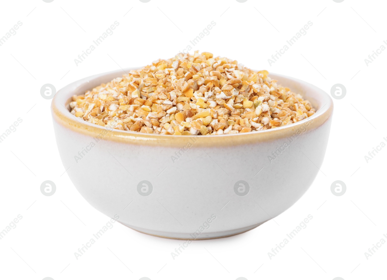 Photo of Dry wheat groats in bowl isolated on white