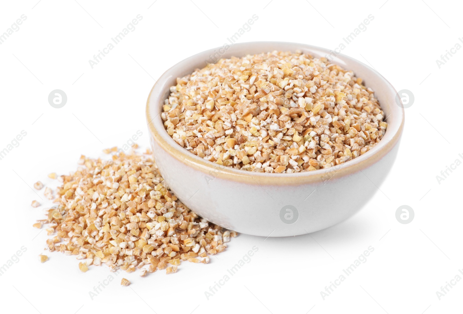 Photo of Dry wheat groats in bowl isolated on white