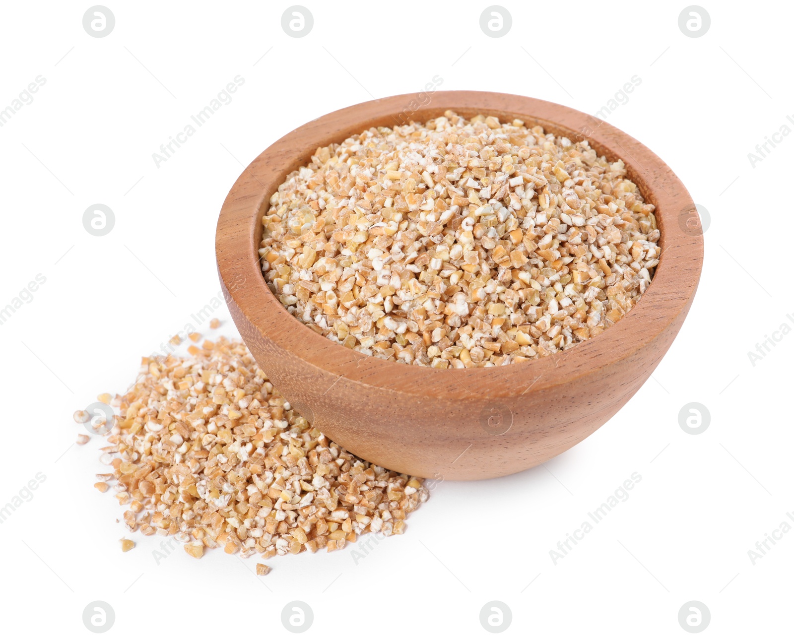 Photo of Dry wheat groats in wooden bowl isolated on white