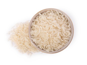 Raw rice in bowl isolated on white, top view