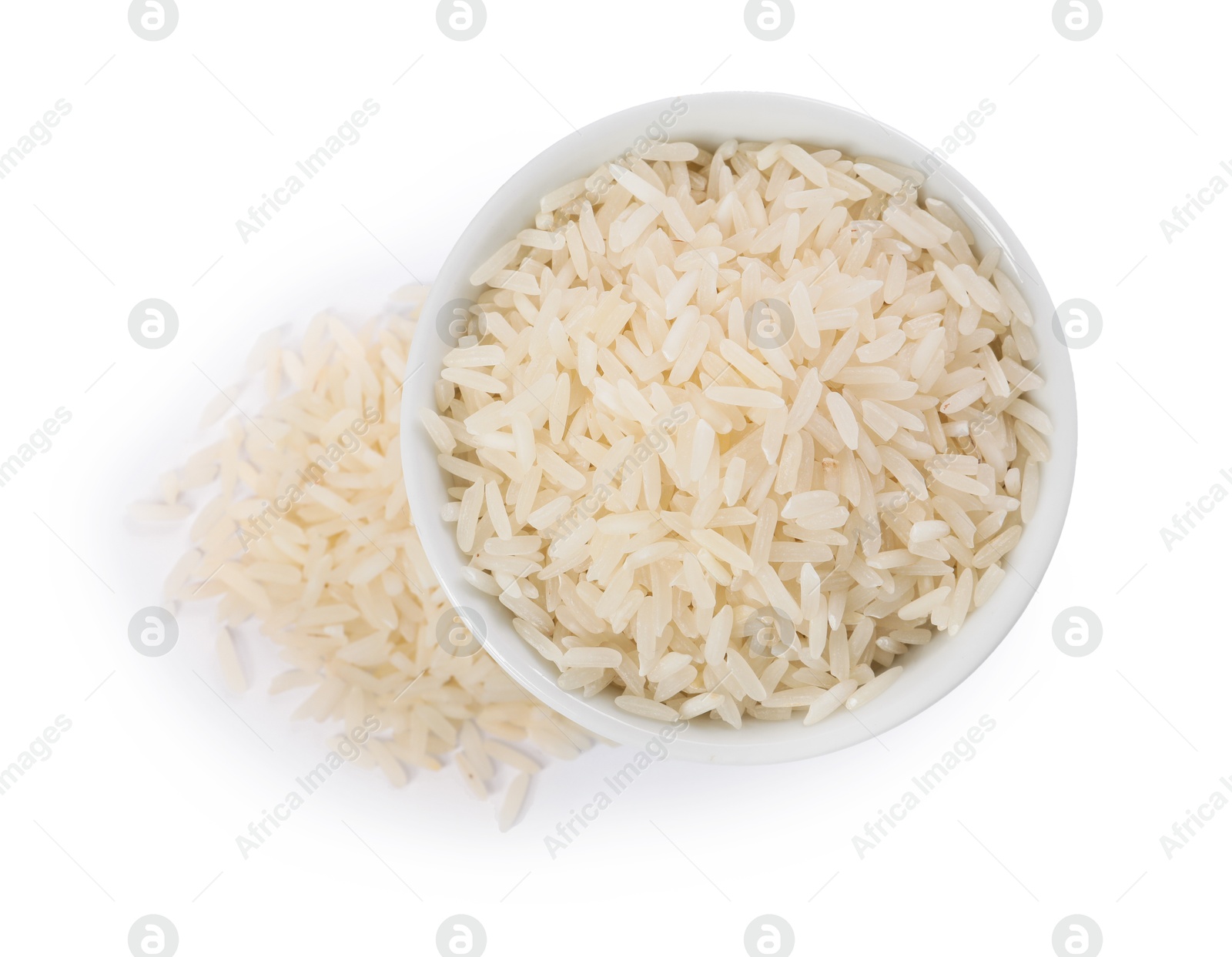 Photo of Raw rice in bowl isolated on white, top view