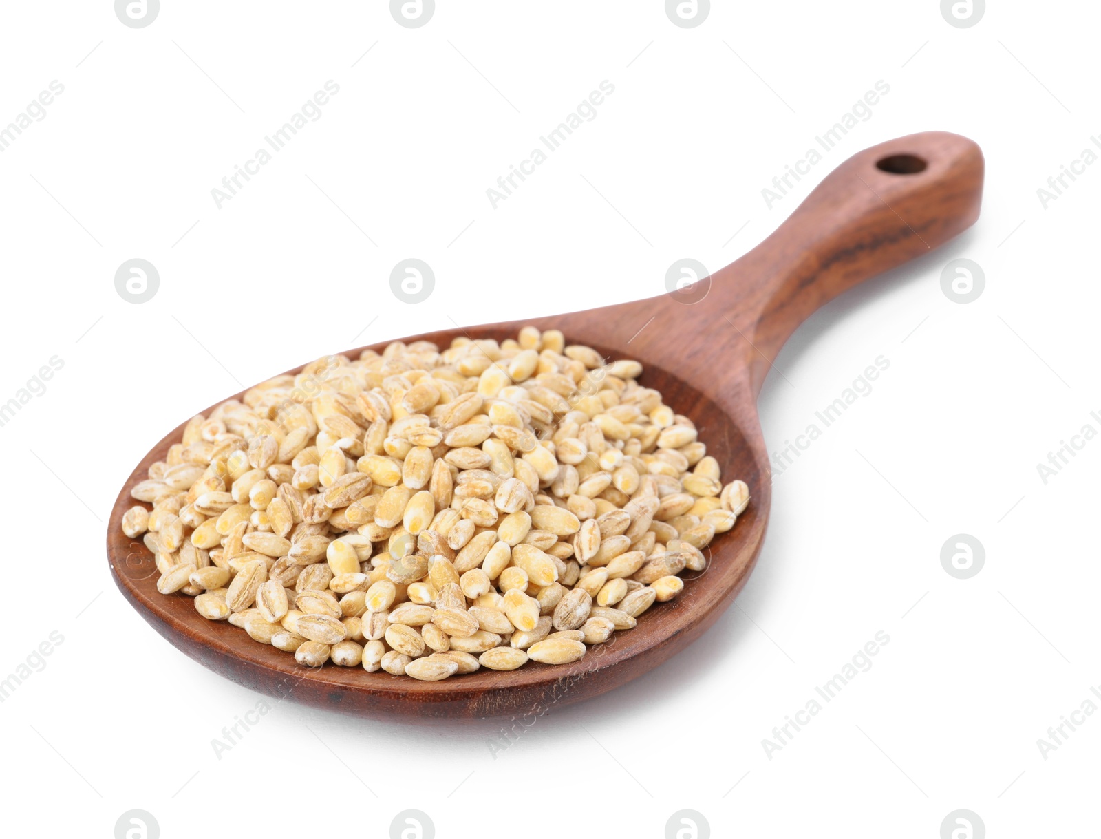 Photo of Spoon with pearl barley groats isolated on white