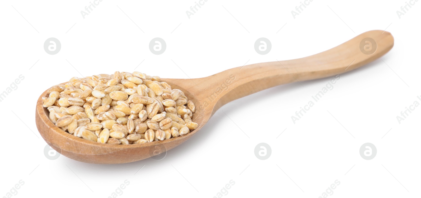 Photo of Spoon with pearl barley groats isolated on white