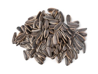 Photo of Pile of sunflower seeds isolated on white, top view