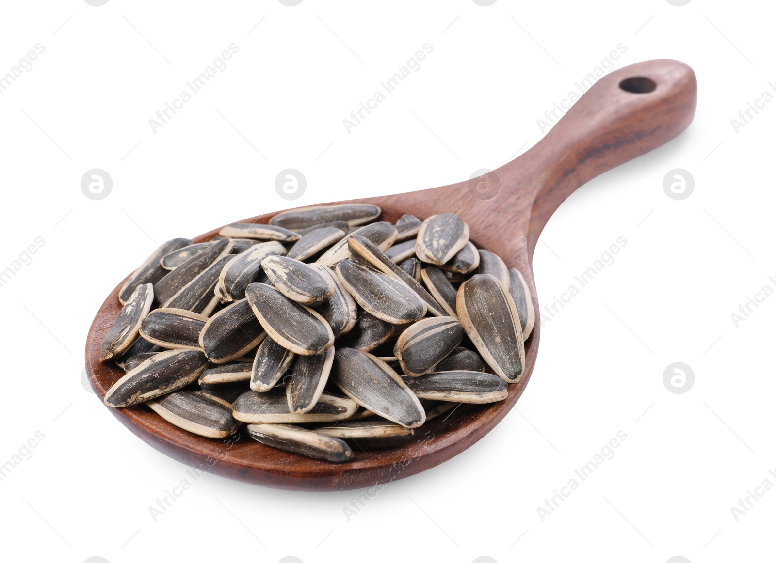 Photo of Sunflower seeds in wooden spoon isolated on white