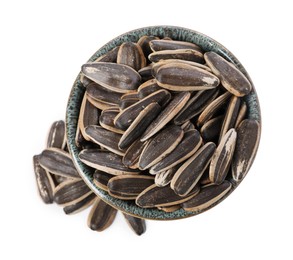 Sunflower seeds in bowl isolated on white, top view