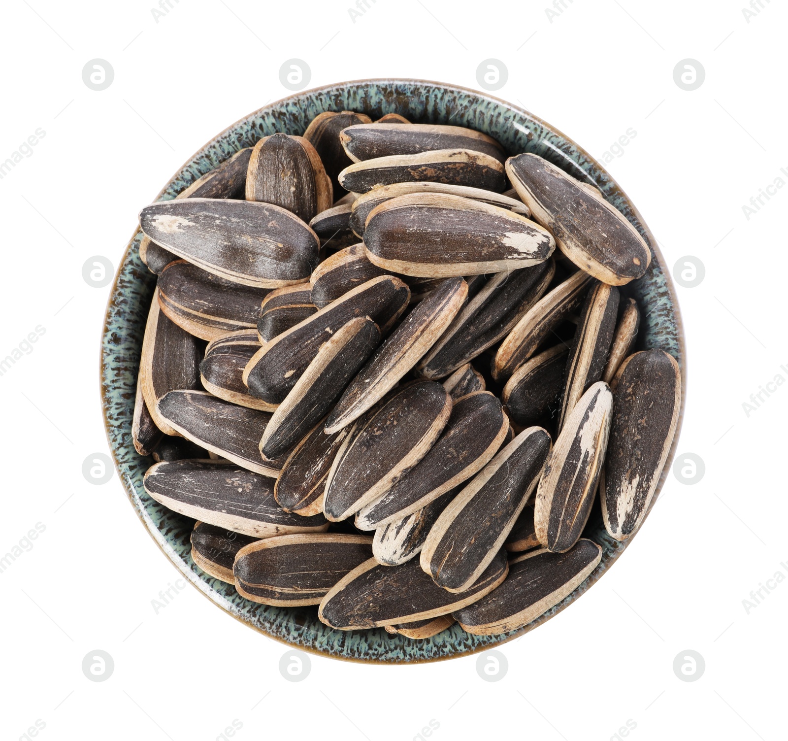 Photo of Sunflower seeds in bowl isolated on white, top view