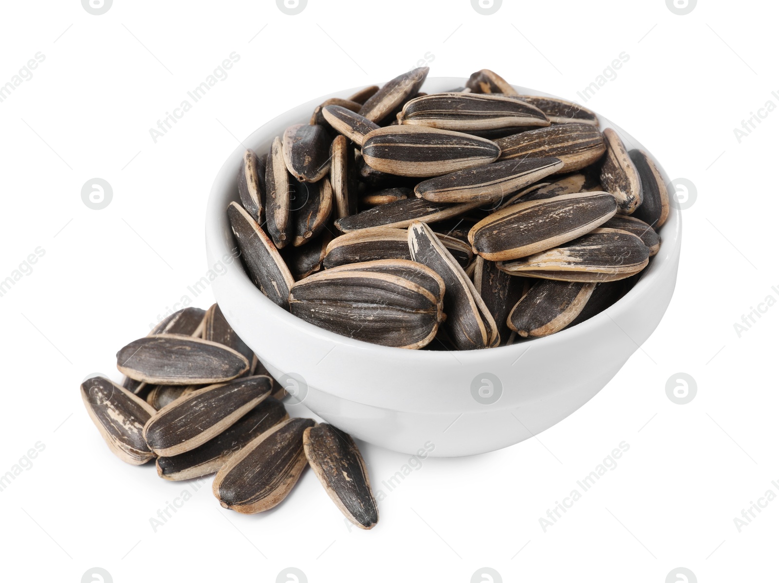 Photo of Sunflower seeds in bowl isolated on white