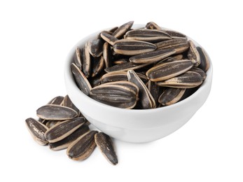 Sunflower seeds in bowl isolated on white