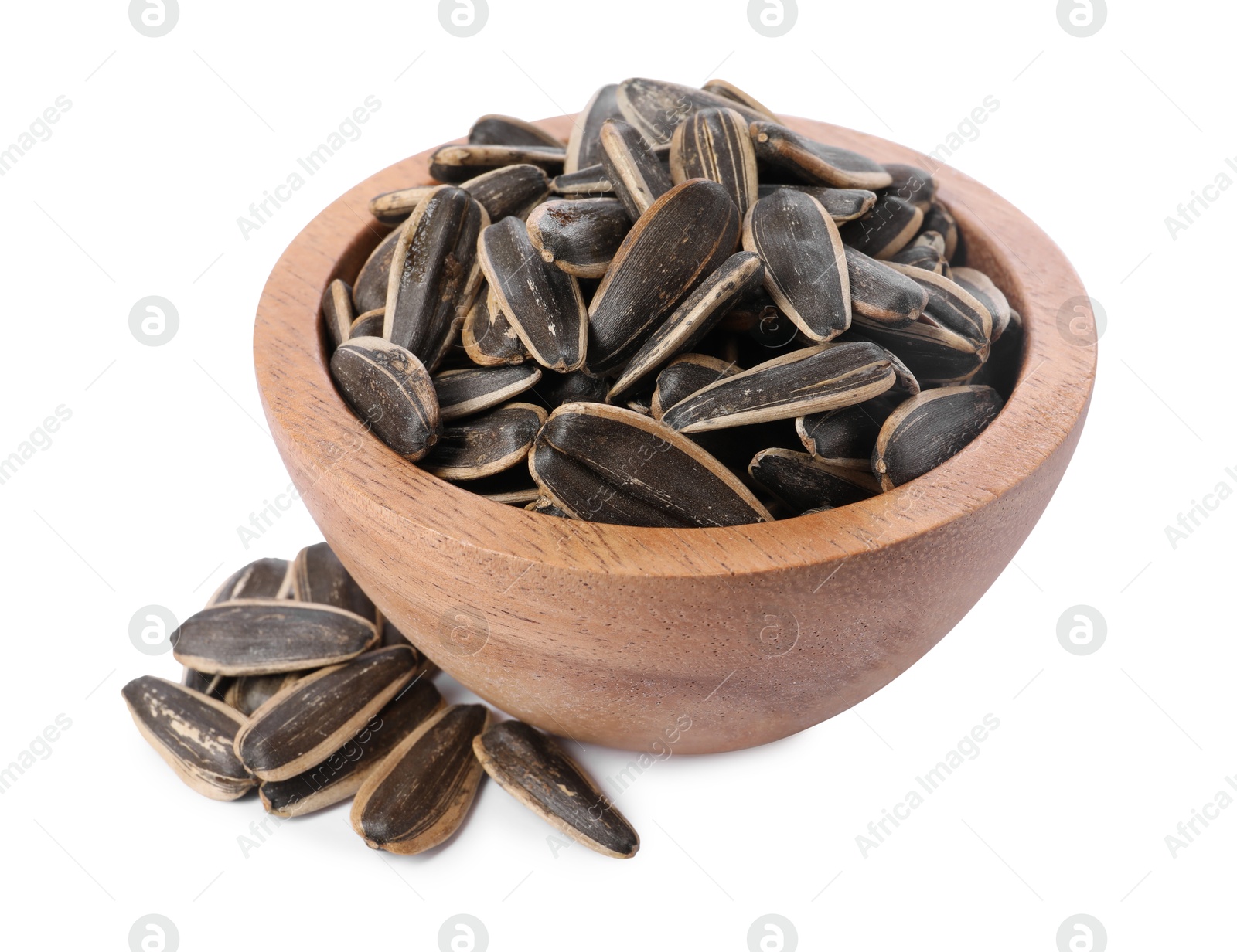 Photo of Sunflower seeds in wooden bowl isolated on white