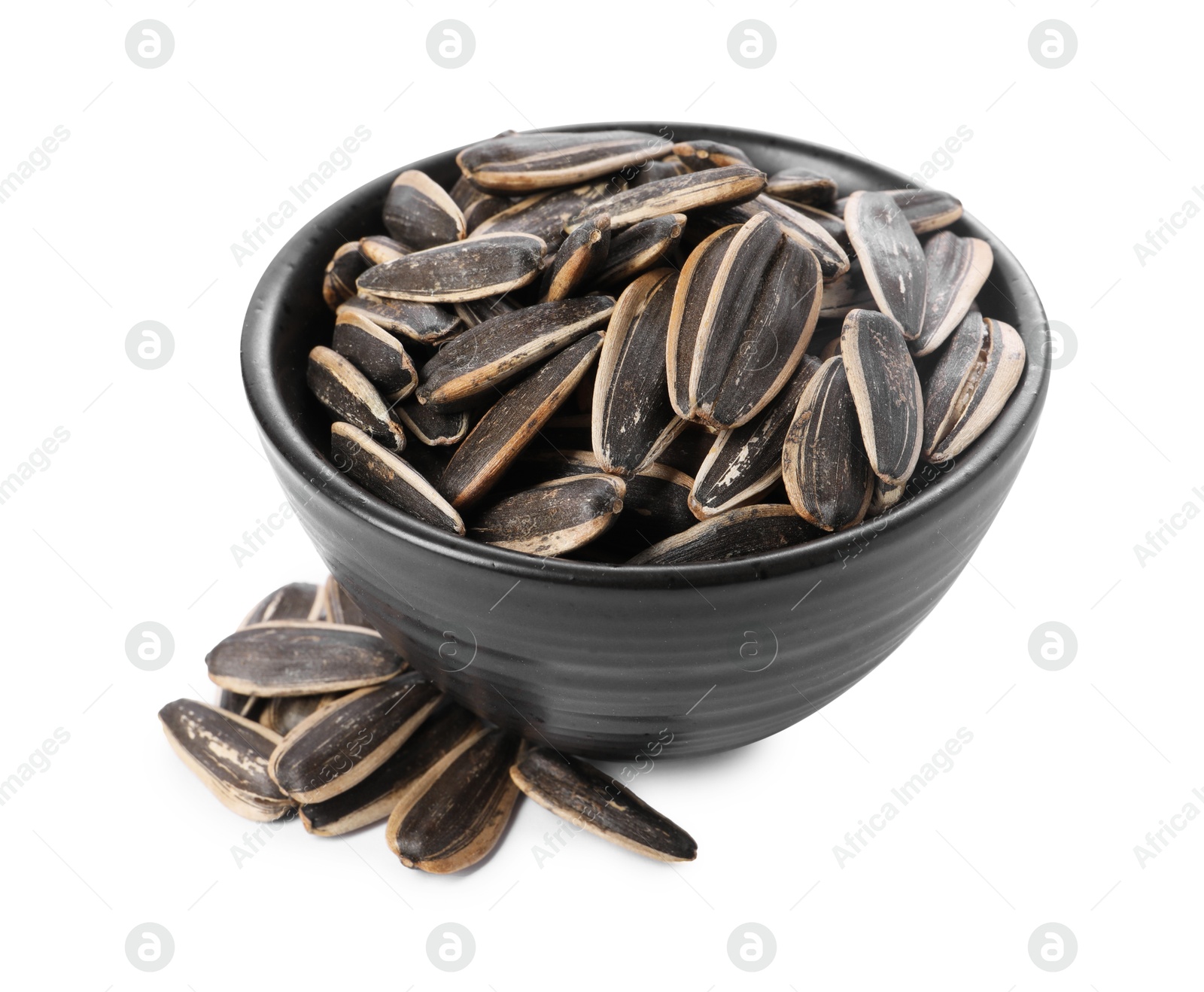 Photo of Sunflower seeds in bowl isolated on white